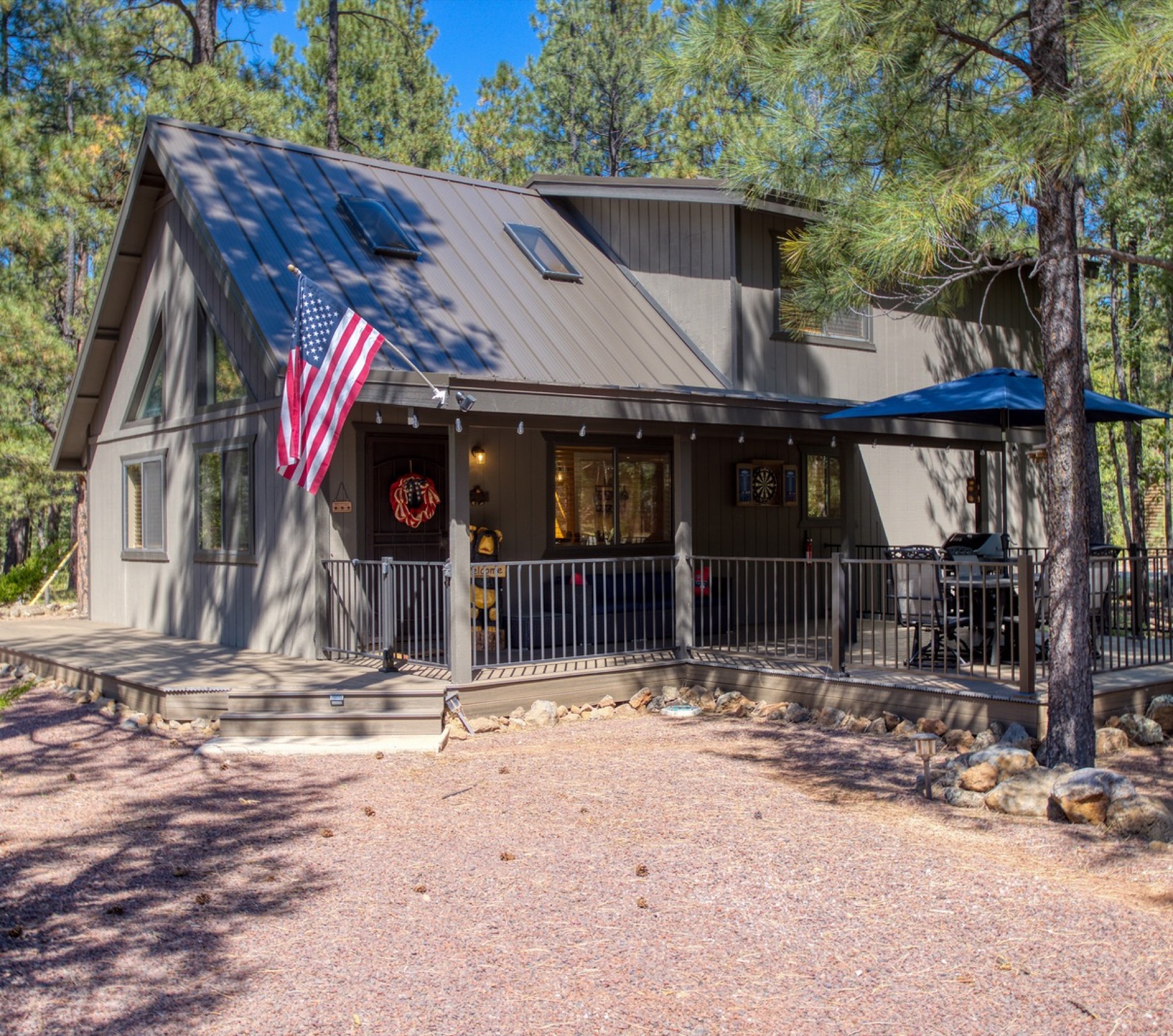Bears Bungalow cabin exterior surrounded by pine trees